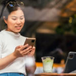 smart-attractive-positive-asian-digital-nomad-female-wearing-casual-cloth-work-remote-new-normal-lifestyle-hand-use-tablet-tele-conference-onlive-videocall-meeting-remote-coffeeshop-cafe_609648-2908